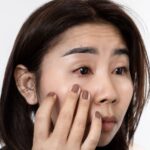 Young slim woman enjoys weight loss result